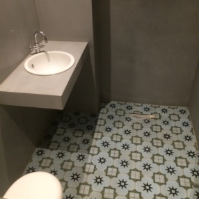Patchwork tiles in bathroom