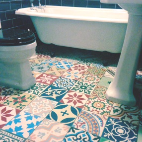 Encaustic tiles patchwork in bathroom